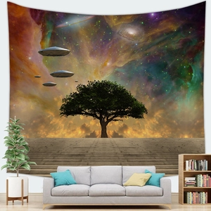 Detailed surreal galaxy tapestry showing a tree and UFOs over a cozy grey sofa setup