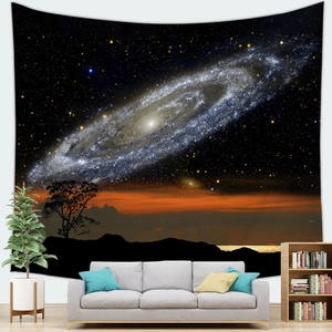 Detail of galaxy tapestry hanging over a sofa for modern bedroom wall decor