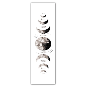 Vertical detail of moon phase wall hanging with watercolor texture and feather accents