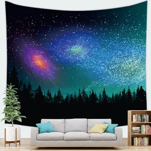 Wall tapestry featuring vibrant galaxy nebula and forest silhouette for bedroom decor