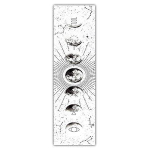 Detailed view of moon phase tapestry showing mystical symbols and star patterns
