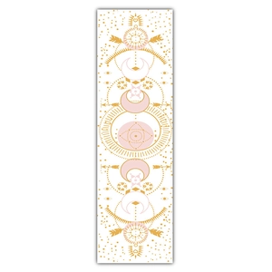 Vertical detail of lunar phase tapestry with gold and pink celestial geometric patterns