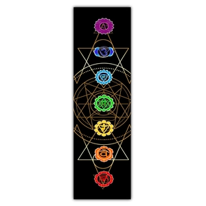 Vertical detail of seven chakra symbols with golden geometric patterns on black tapestry