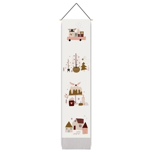 Detailed macro view of Christmas hanging tapestry with snowman and tree illustrations