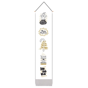 Detail of Christmas wall hanging with black and gold holiday illustrations and greetings