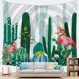 Nordic wall tapestry featuring tropical cacti and flamingo patterns in a cozy living room