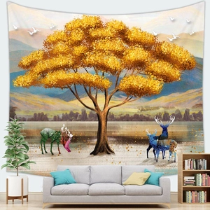Detail of artistic landscape tapestry featuring golden trees and deer in a modern living room