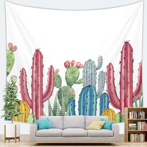 Detailed close-up of a Nordic cactus print tapestry hanging over a sofa in a bright living room