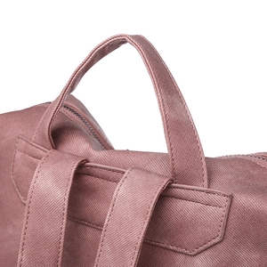 Macro shot of dusty rose PU backpack handle and reinforced stitching detail