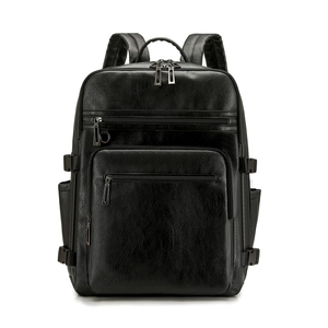 Black leather business backpack for women featuring multiple compartments and ergonomic straps