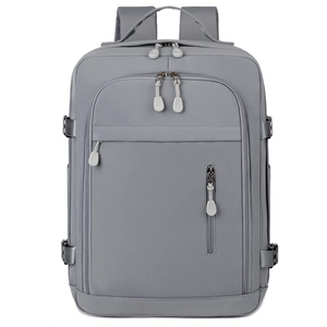 Waterproof grey commuter laptop backpack with expandable capacity for business travel and daily use