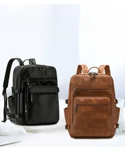 Detail of multi-functional leather backpack showing texture and various zipper pockets