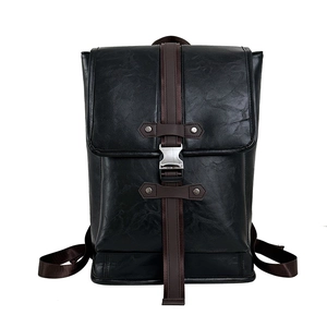 Minimalist black faux leather backpack with brown strap and silver buckle closure