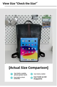 Detail view of large capacity black PU leather backpack showing internal storage for tablets