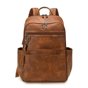 Minimalist brown faux leather backpack for women with multi-pocket design and fringe detail