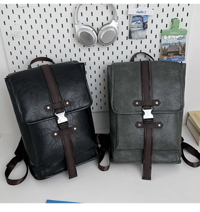 Retro style large backpack set in black and grey-green featuring faux leather and metal buckles