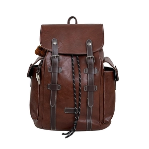 Vintage dark brown large capacity travel backpack with leather texture and drawstring