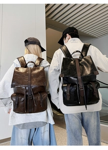 Détails de sacs à dos vintage en cuir marron et noir avec sangles à boucles