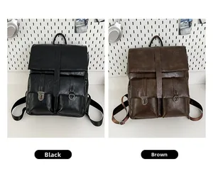 Dettaglio di zaini vintage in nero e marrone con tasche con fibbia in similpelle