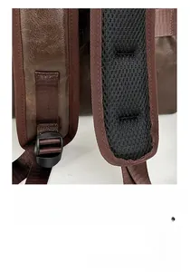 Detail of ergonomic S-shaped padded shoulder straps with breathable mesh and leather