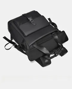Top display of black business backpack with waterproof fabric and buckle detail