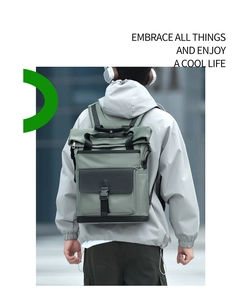 Men's commuter backpack featuring roll-top design and durable grey-green fabric material