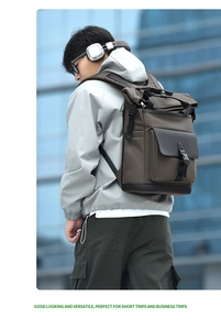 Outdoor model shot of a waterproof business backpack with buckle closure in dark brown
