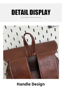 Detail of vintage brown PU leather backpack handle with reinforced white stitching