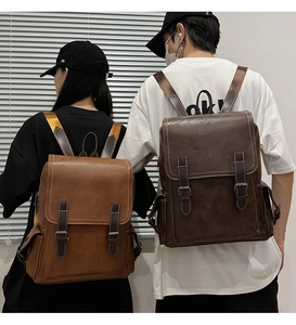 Detailed view of vintage PU leather backpack with buckle straps and large capacity