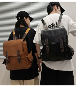 Detail view of vintage PU leather backpack featuring classic flap and metal buckles