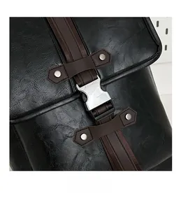 Detail of premium metal buckle and textured black leather on retro laptop backpack