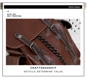 Close-up of vintage brown leather backpack showing metal buckles and reinforced stitching