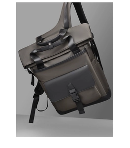Macro shot of business backpack featuring adjustable black buckle and matte waterproof fabric