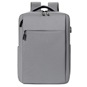 Minimalist grey business laptop backpack with USB charging port and durable nylon fabric