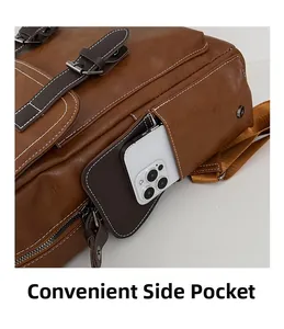 Macro view of a brown vintage leather backpack showing a convenient side pocket for a phone