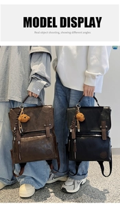 Detail view of retro PU leather backpacks in black and brown with plush bear pendant