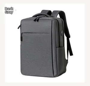 Detail of dark grey business backpack with side USB charging port and textured fabric