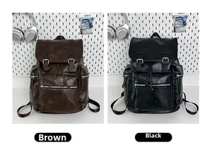 Detail view of retro brown and black faux leather backpacks with metal buckles