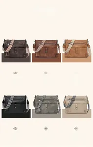 Detailed view of women's vintage washed leather bags in six colors with ethnic woven straps
