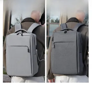 Detail view of business backpack with external USB charging port and waterproof fabric