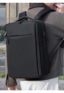 Detail of black business backpack with USB charging port and waterproof oxford fabric