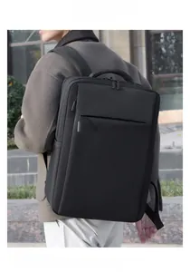 Close-up of durable black business backpack with waterproof matte texture and padded handle