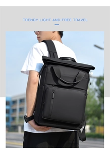 Close-up of black roll-top business backpack with front zipper pocket and wide handle