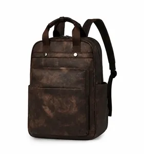 Side view detail of a dark brown vintage PU leather backpack with silver rivet accents