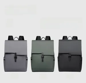 Detailed comparison of minimalist backpacks in dark gray, forest green, and classic black