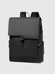 Side view detail of a sleek black business laptop backpack with matte waterproof finish