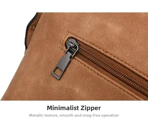Detail of vintage washed leather bag showing sturdy grey metal zipper and precision stitching
