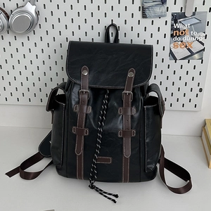 Vintage black PU leather backpack with brown buckle straps and large capacity for travel