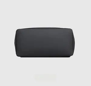 Detailed view showing the flat rectangular bottom of the black casual laptop backpack