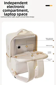Internal storage view of beige laptop backpack showing padded compartments and straps
